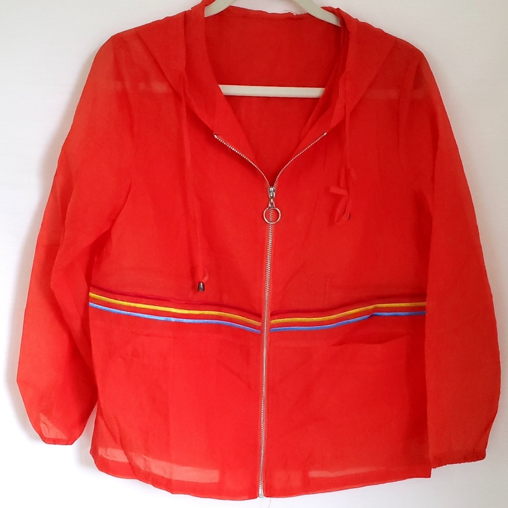 Orange sheer lightweight jacket with rainbow stripe and hood #festival #rave
